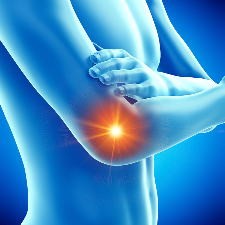 Ayurvedic doctor providing tennis elbow treatment in Dubai with herbal therapy
